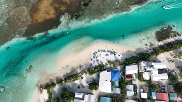 beach, bikini-beach, drone-shot, local-island, sea - Stunning aerial drone shot of the sunny Bikini Beach on Dhiffushi local island, featuring crystal turquoise sea.