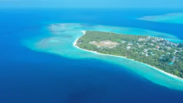 drone-shot, local-island, nature, sea - Stunning drone aerial view of Feridhoo local island in Alifu Atoll, surrounded by crystal clear blue lagoon water.
