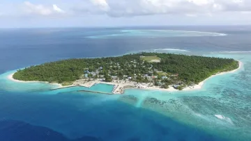 drone-shot, local-island, nature, sea - Aerial view of Feridhoo local island in North Ari Atoll surrounded by lush vegetation and crystal clear blue lagoons.