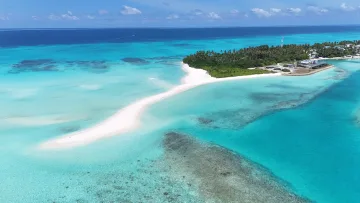 beach, drone-shot, local-island, nature, sea - Aerial drone shot of the long white sandbank connected to the local island of Fulhadhoo in the Maldives Baa Atoll.