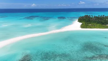 beach, drone-shot, local-island, nature, sea - Aerial view of the long white sandbank stretching into the turquoise lagoon at Fulhadhoo Island in the Baa Atoll.