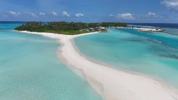 beach, drone-shot, local-island, nature, sea - An aerial shot of the long white sandbank extending from the lush local island of Fulhadhoo in the Baa Atoll Maldives.
