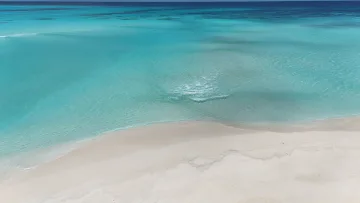 beach, bikini-beach, drone-shot, local-island, sea - Aerial view of the turquoise lagoon and white sandy beach of Fulhadhoo Island in the beautiful Baa Atoll, Maldives.