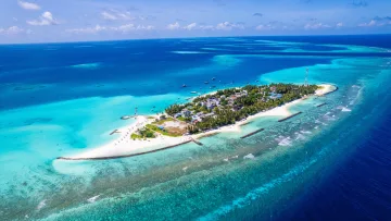 drone-shot, local-island, nature, sea - Stunning aerial drone shot of the local island of Fulidhoo in Vaavu Atoll, surrounded by crystal clear blue water.