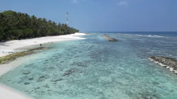 beach, drone-shot, local-island, nature, sea - Aerial perspective of the white sand beach and turquoise lagoon on Fulidhoo island in Vaavu Atoll, Maldives.
