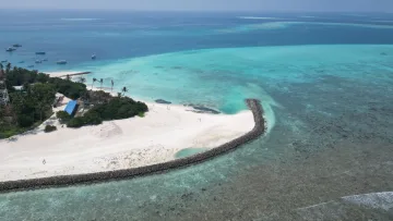 beach, drone-shot, local-island, sea - Drone view showing the white sandy beach and turquoise lagoon of Fulidhoo Island in the beautiful Vaavu Atoll.