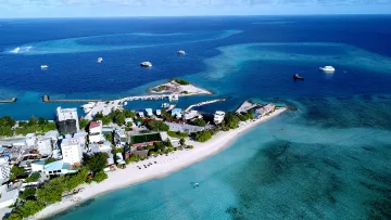 bikini-beach, drone-shot, local-island, sea - Stunning drone aerial view of the local Gulhi Island in Kaafu Atoll, featuring the bikini beach and marina area.