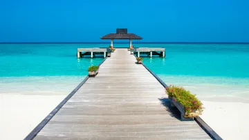 local-island, sea - A beautiful wooden jetty extending into the turquoise lagoon of Hanimaadhoo local island, Haa Dhaalu atoll, Maldives