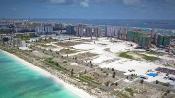 drone-shot, local-island - Aerial view of urban construction and modern buildings in Hulhumalé, a growing local island in Kaafu Atoll, Maldives.