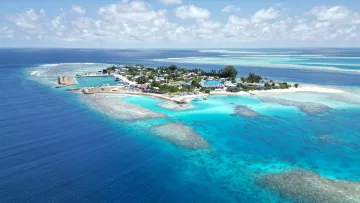 drone-shot, local-island, reef, sea - Aerial drone shot of Keyodhoo local island in Vaavu Atoll, surrounded by crystal clear blue water and coral reefs.