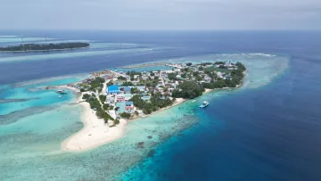 drone-shot, local-island, sea - Aerial drone shot of Keyodhoo local island in Vaavu Atoll, showing the white beach, turquoise lagoon and houses.