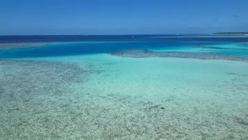 drone-shot, local-island, nature, reef, sea - Aerial view of the turquoise lagoon and coral reefs at Keyodhoo local island in the beautiful Vaavu Atoll.