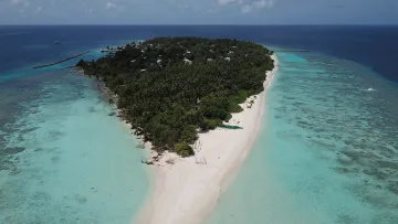 drone-shot, local-island, nature, sea - Drone perspective of Omadhoo local island in Alifu Dhaalu Atoll, surrounded by turquoise waters and a sandy beach.