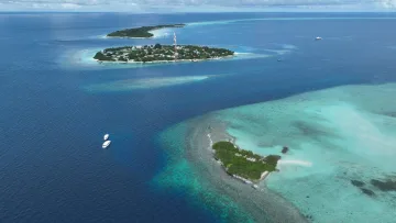 drone-shot, local-island, nature, reef, sea - Aerial perspective of Rasdhoo local island and the uninhabited Madivaru island in North Ari Atoll, surrounded by reef.
