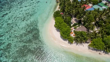 beach, drone-shot, local-island, nature, sea - Aerial drone shot of Thinadhoo local island in Vaavu Atoll, showing the white sandy beach and crystal clear lagoon.