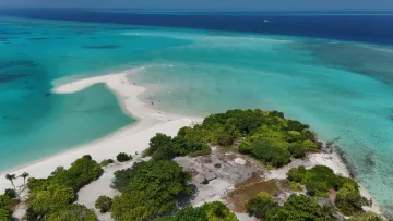 beach, drone-shot, local-island, nature, sea - Aerial view of the stunning sandbank on Vashafaru local island in Haa Alifu Atoll, Maldives with turquoise waters.