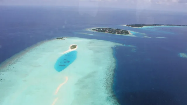 local-island, nature, sea - Beautiful aerial view showing the sandbar of Madivaru and the local island of Rasdhoo in North Ari Atoll, Alifu Alifu, Maldives from the plane