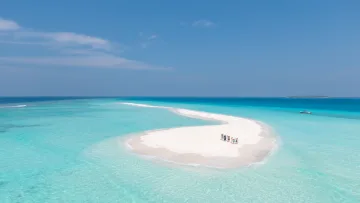 beach, drone-shot, people, sea - Aerial drone shot of a small group of people walking on a pristine white sandbank surrounded by turquoise ocean waters