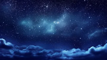 sky - A beautiful view of a deep blue night sky filled with bright shining stars above soft clouds at night time.